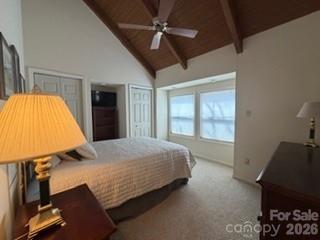 19 Lookout Loop Burnsville, NC 28714 - Photo 19 of 30 a bed room with a bed and a television