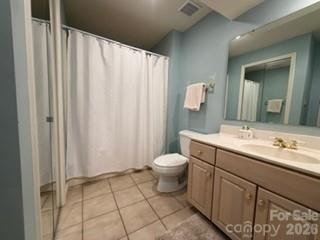 19 Lookout Loop Burnsville, NC 28714 - Photo 20 of 30 a bathroom with a toilet sink and shower