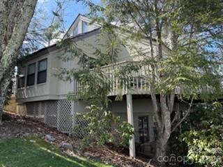 19 Lookout Loop Burnsville, NC 28714 - Photo 5 of 30 a view of a house with a tree front of house