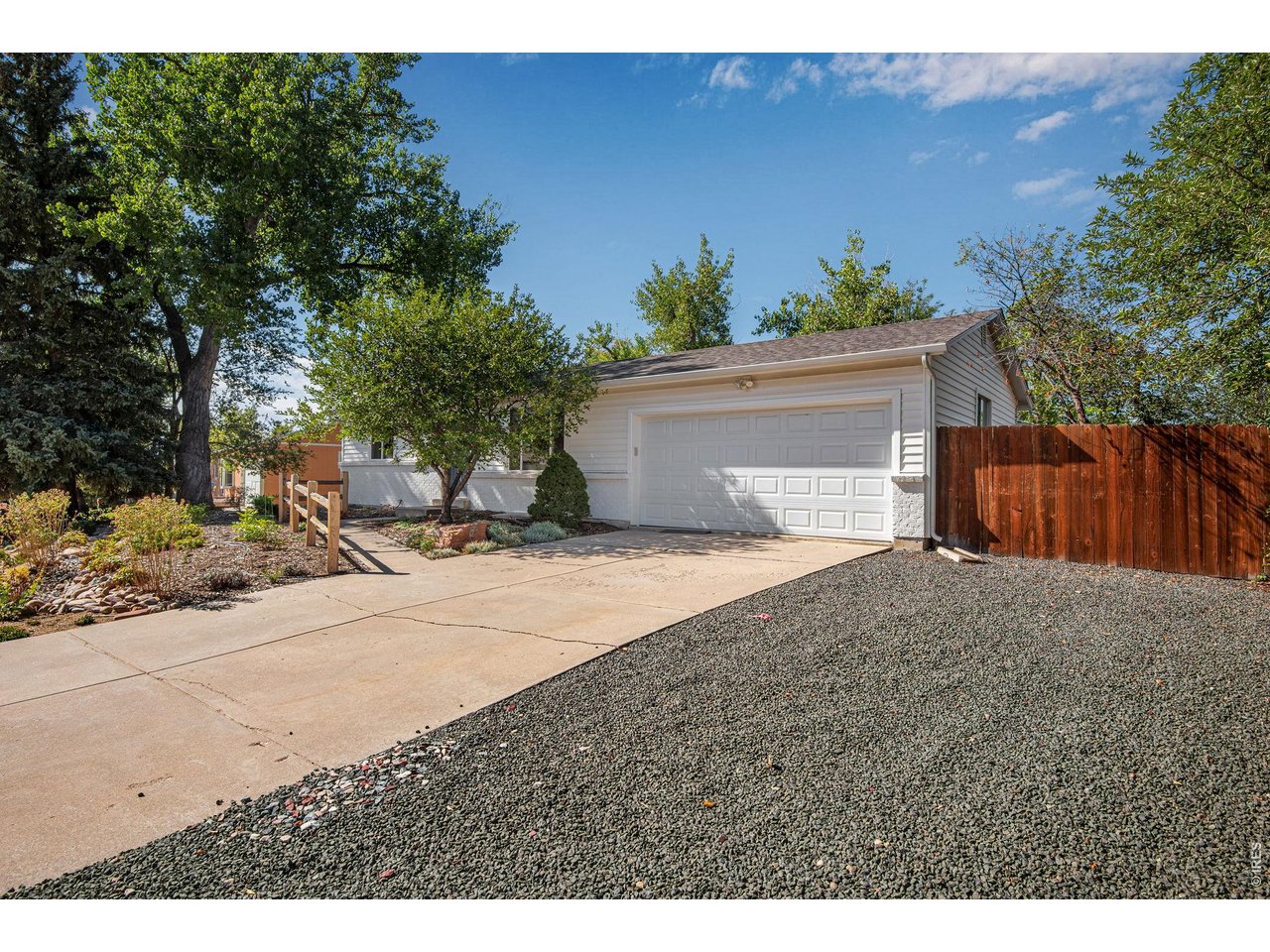 7618 Aberdeen Way Boulder, CO 80301 - Photo 7 of 50 Front of Home and Extra Parking