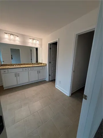 a view of house with garage