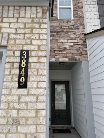 a brick building with a door