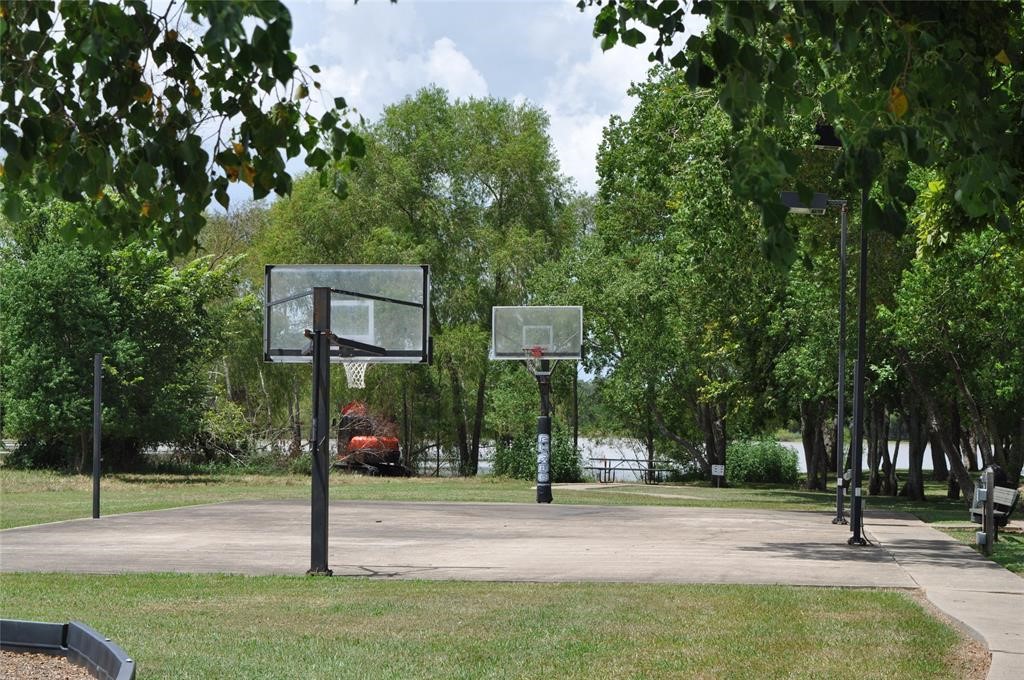 22819 Pittman Drive Angleton, TX 77515 - Photo 5 of 13 a view of a park with swings