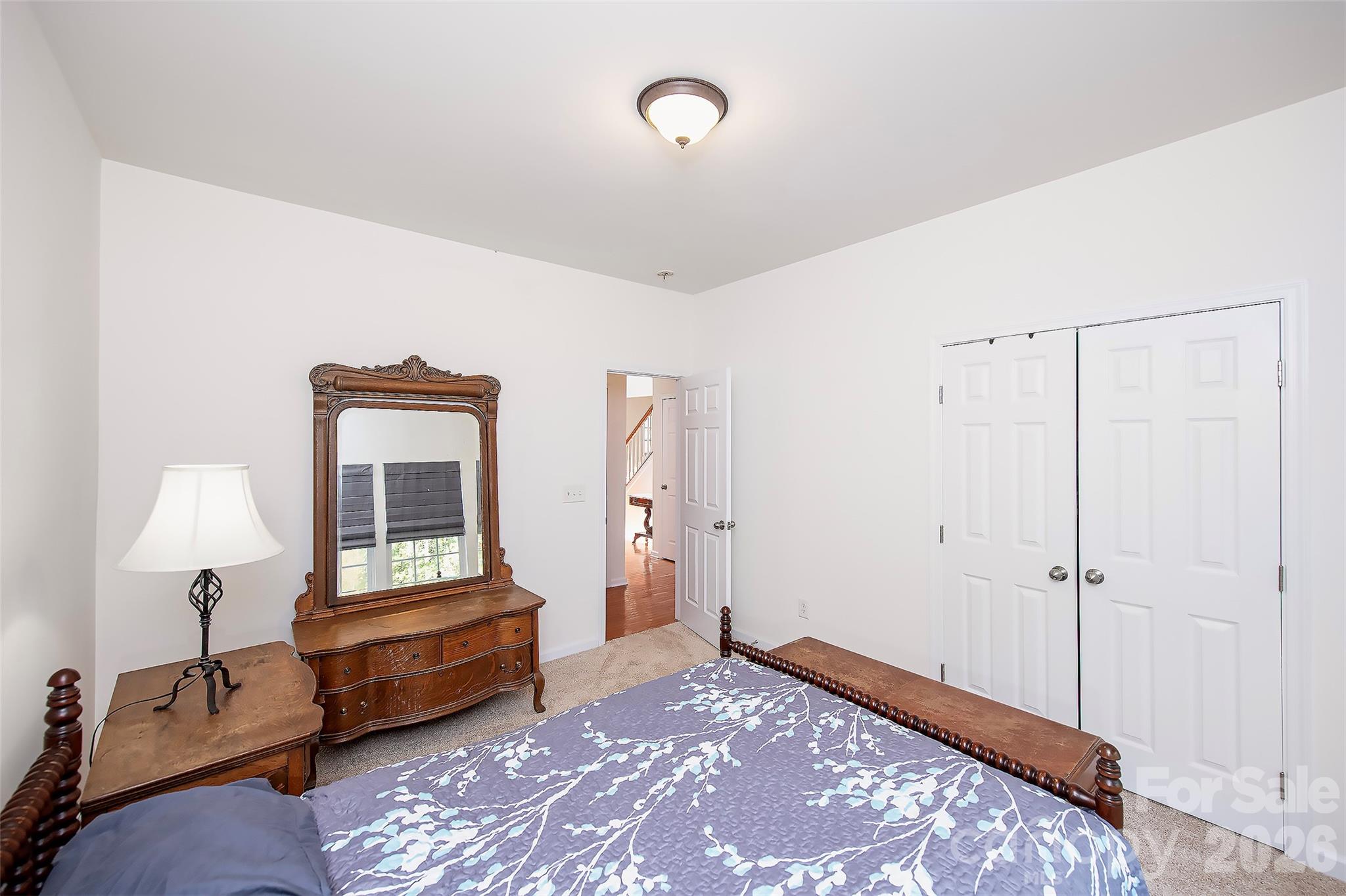 1957 Faison Avenue Fort Mill, SC 29708 - Photo 16 of 33 a bedroom with a bed and a table