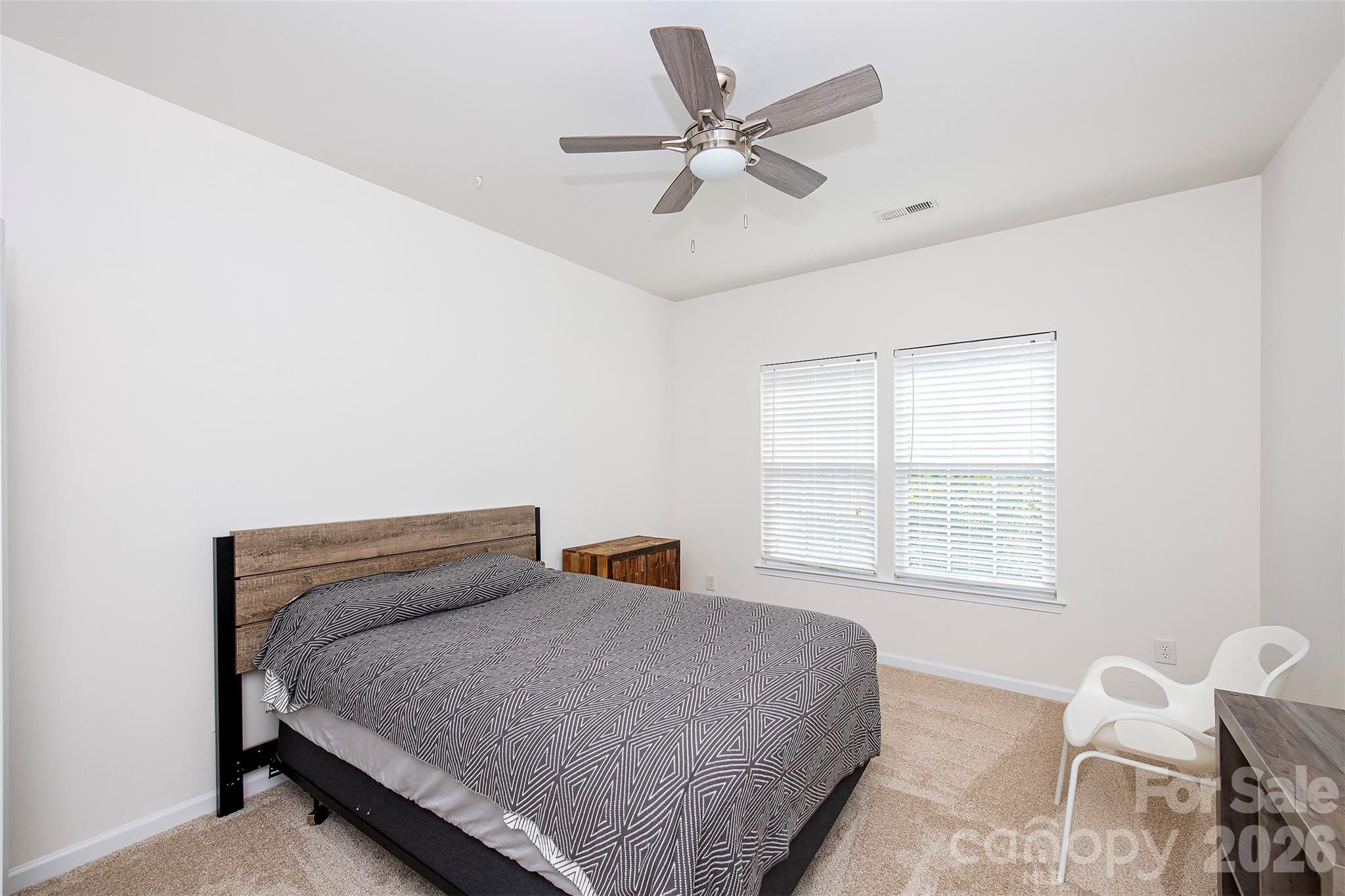 1957 Faison Avenue Fort Mill, SC 29708 - Photo 17 of 33 a bedroom with a bed and window