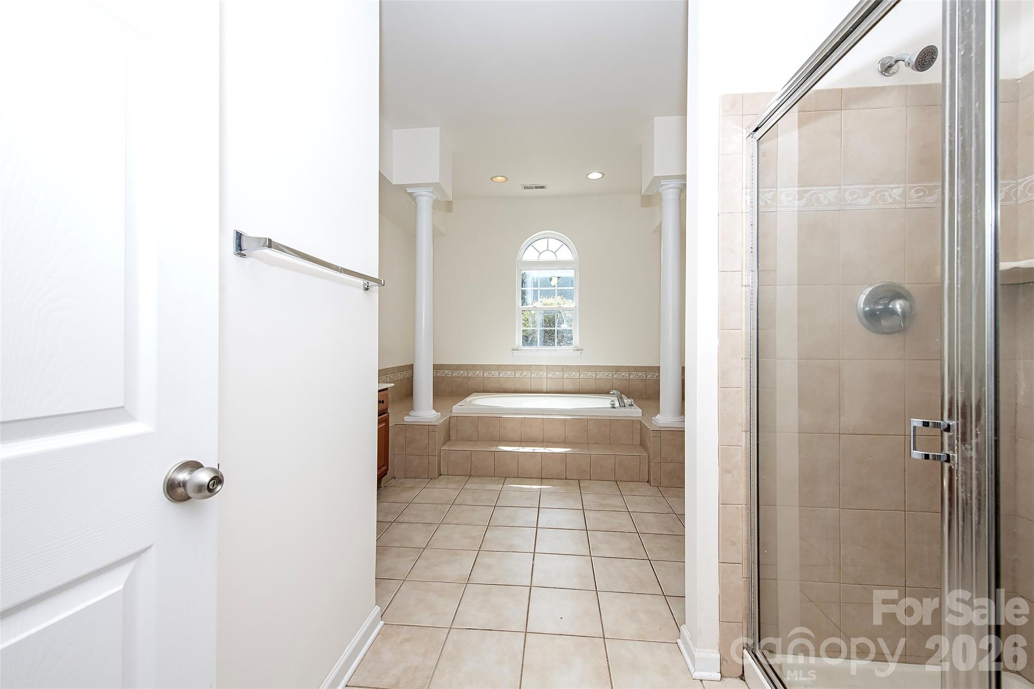 1957 Faison Avenue Fort Mill, SC 29708 - Photo 25 of 33 a bathroom with a tub shower and mirror