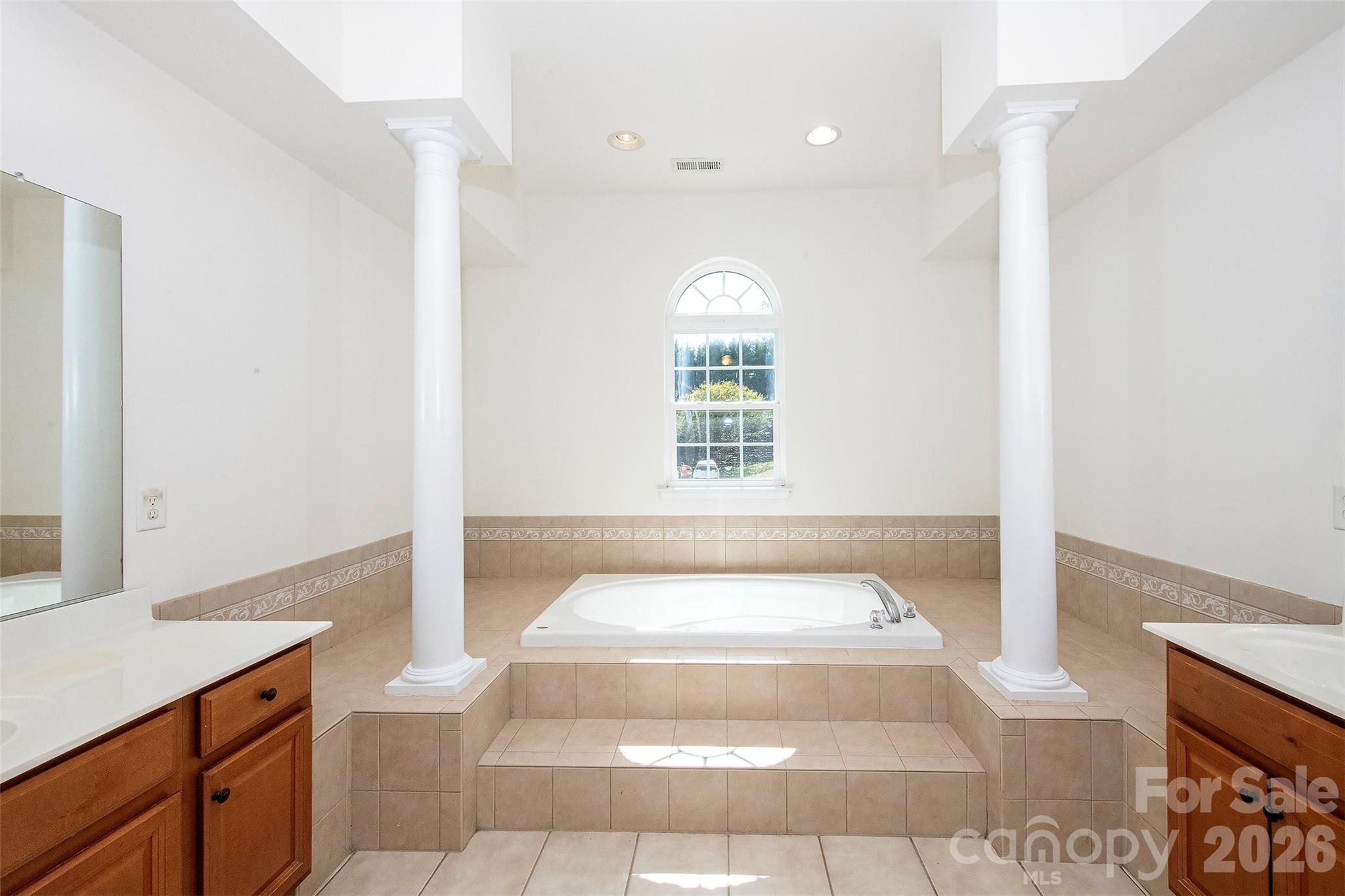 1957 Faison Avenue Fort Mill, SC 29708 - Photo 26 of 33 a spacious bathroom with a tub and window