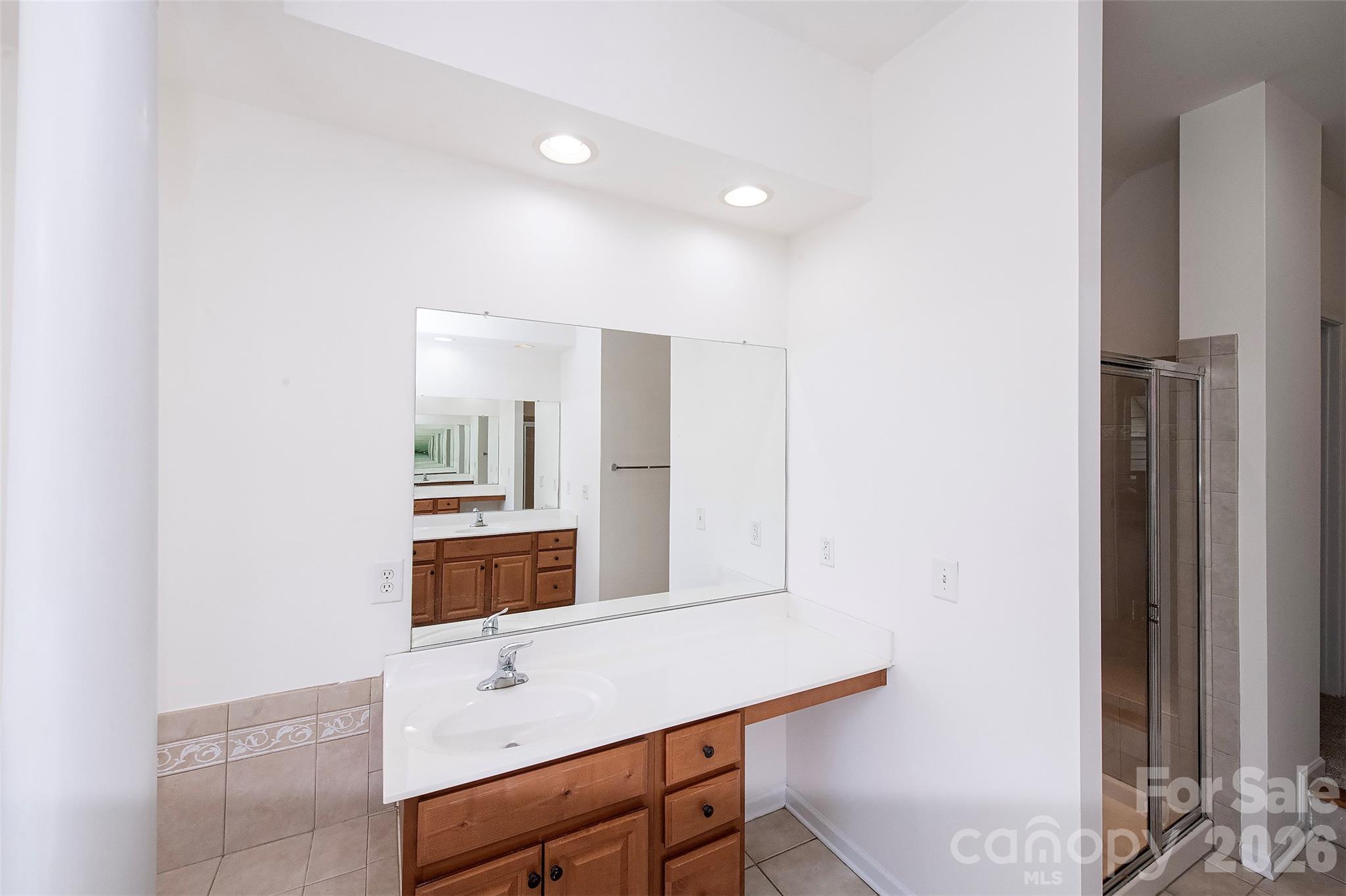 1957 Faison Avenue Fort Mill, SC 29708 - Photo 27 of 33 a bathroom with a sink and a mirror