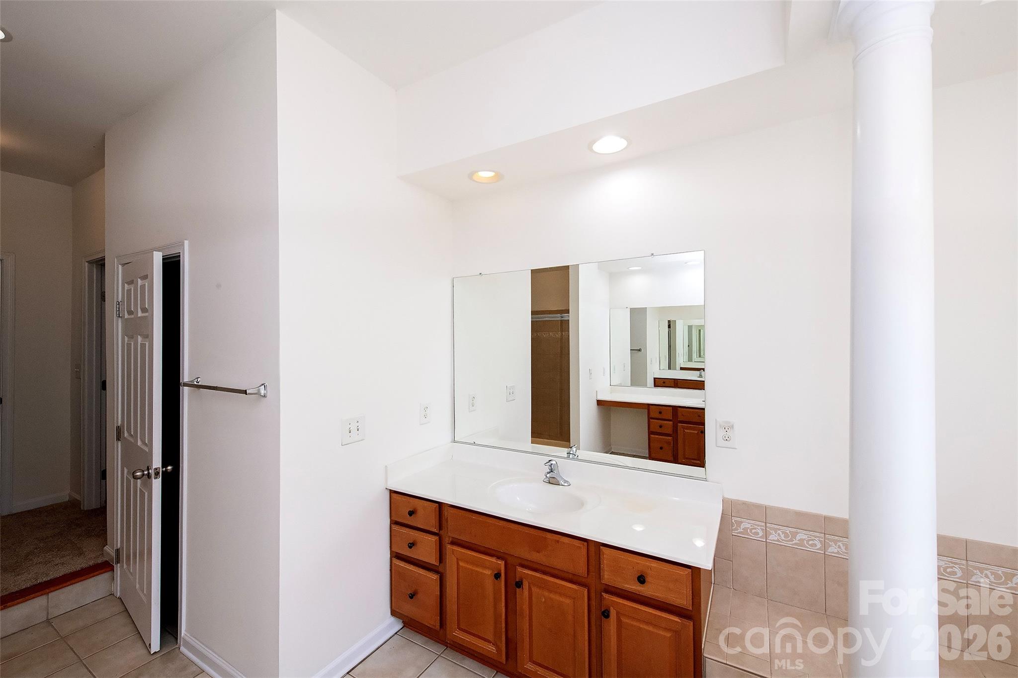 1957 Faison Avenue Fort Mill, SC 29708 - Photo 32 of 33 a bathroom with a double vanity sink and mirror