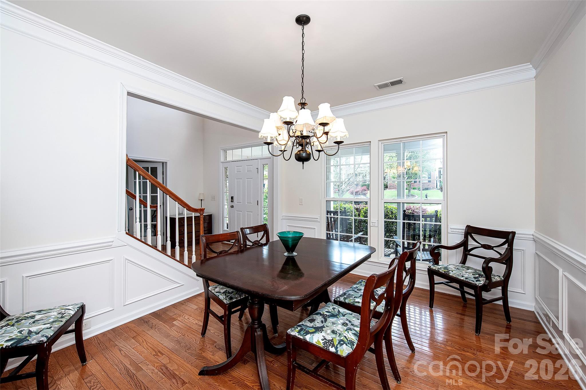 1957 Faison Avenue Fort Mill, SC 29708 - Photo 5 of 33 a dining room with furniture a chandelier and wooden floor
