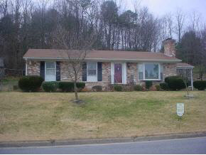 1288 Pinehurst Road Staunton, VA 24401 - Photo 1 of 1 a front view of a house with a yard