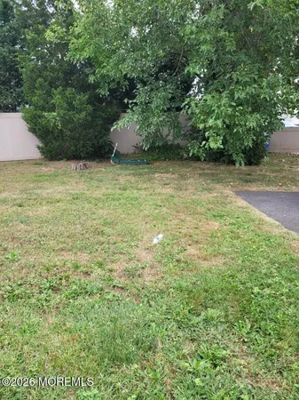 a view of an outdoor space and a yard
