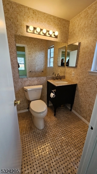 501 Red Crest Lane Somerville, NJ 08876 - Photo 16 of 24 a bathroom with a sink a toilet a mirror and shower