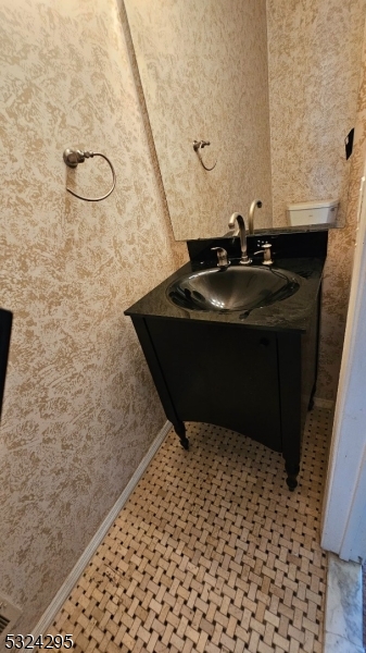 501 Red Crest Lane Somerville, NJ 08876 - Photo 20 of 24 a bathroom with a sink and a mirror