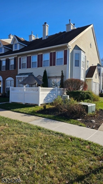 501 Red Crest Lane Somerville, NJ 08876 - Photo 22 of 24 a front view of a house with a yard