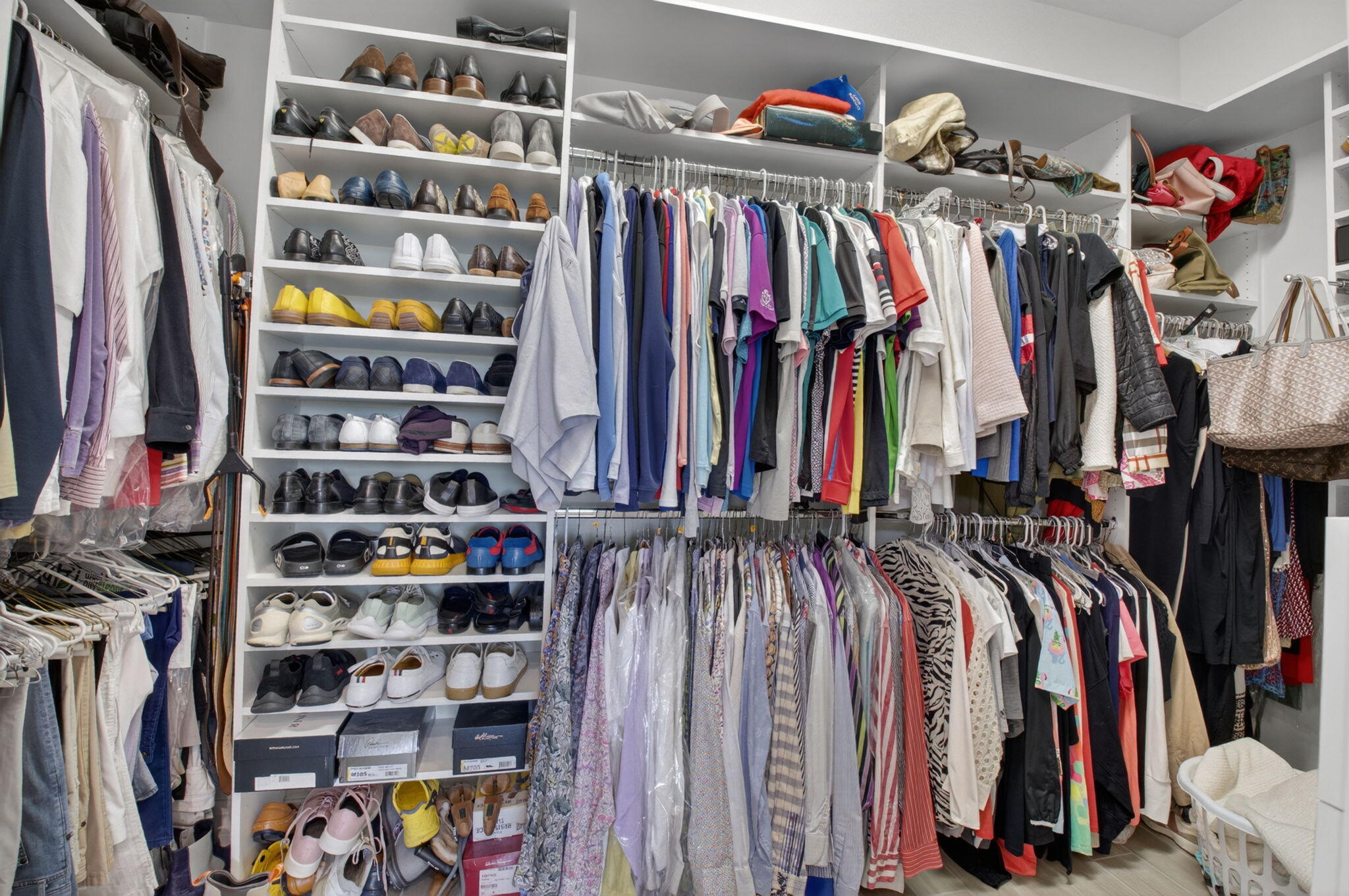 21956 Canadensis Circle, Unit 201 Boca Raton, FL 33428 - Photo 22 of 37 Primary Closet