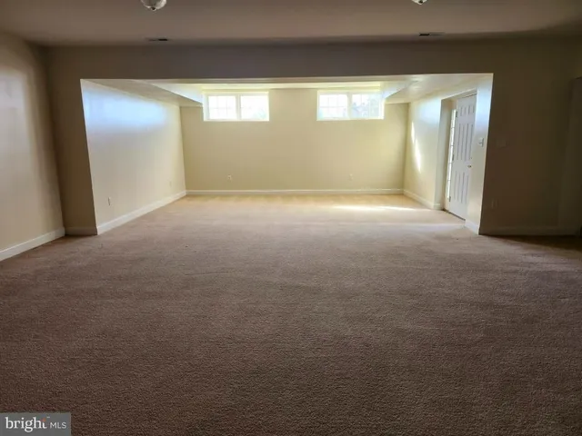 a view of a room with an empty space