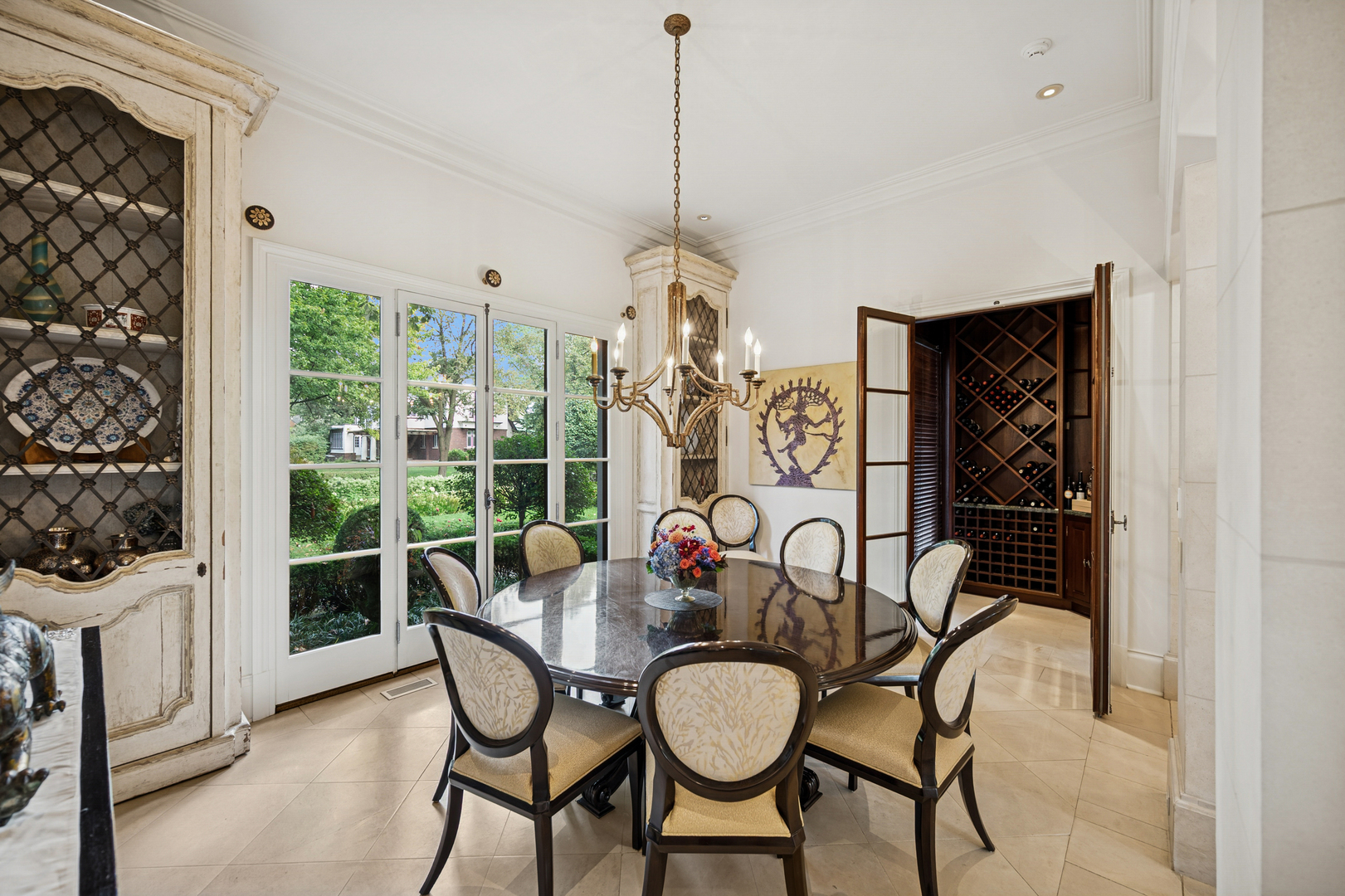 528 Roslyn Road Kenilworth, IL 60043 - Photo 20 of 62 a dining room with furniture a chandelier and window