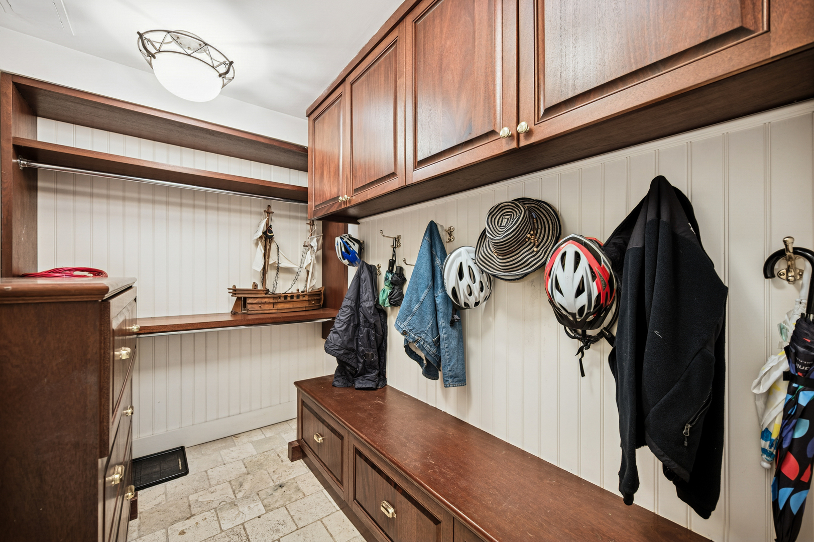 528 Roslyn Road Kenilworth, IL 60043 - Photo 49 of 62 a view of walk in closet with clothes and shoes