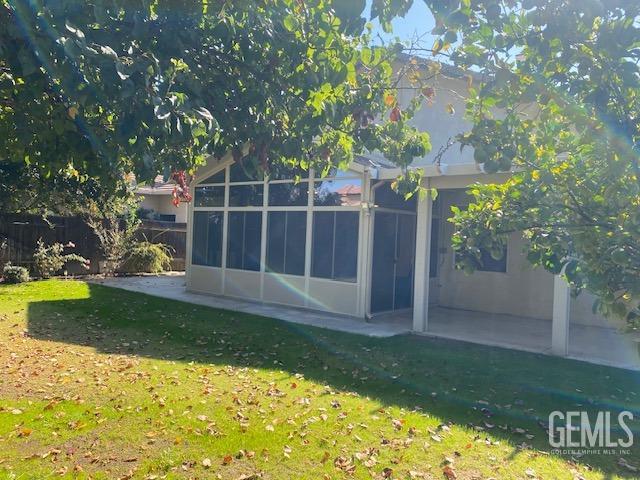 Undisclosed Address Bakersfield, CA 93312 - Photo 17 of 19 a view of a chair and table in the garden