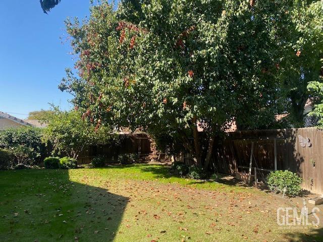 Undisclosed Address Bakersfield, CA 93312 - Photo 18 of 19 a view of a house with a yard