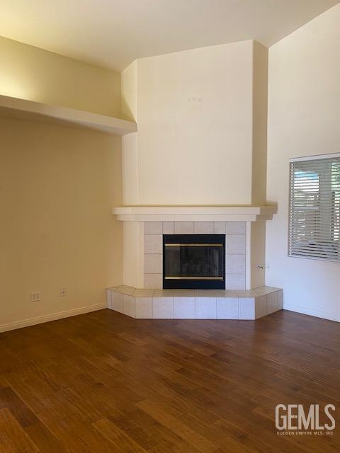 Undisclosed Address Bakersfield, CA 93312 - Photo 8 of 19 a view of an empty room with wooden floor and a window
