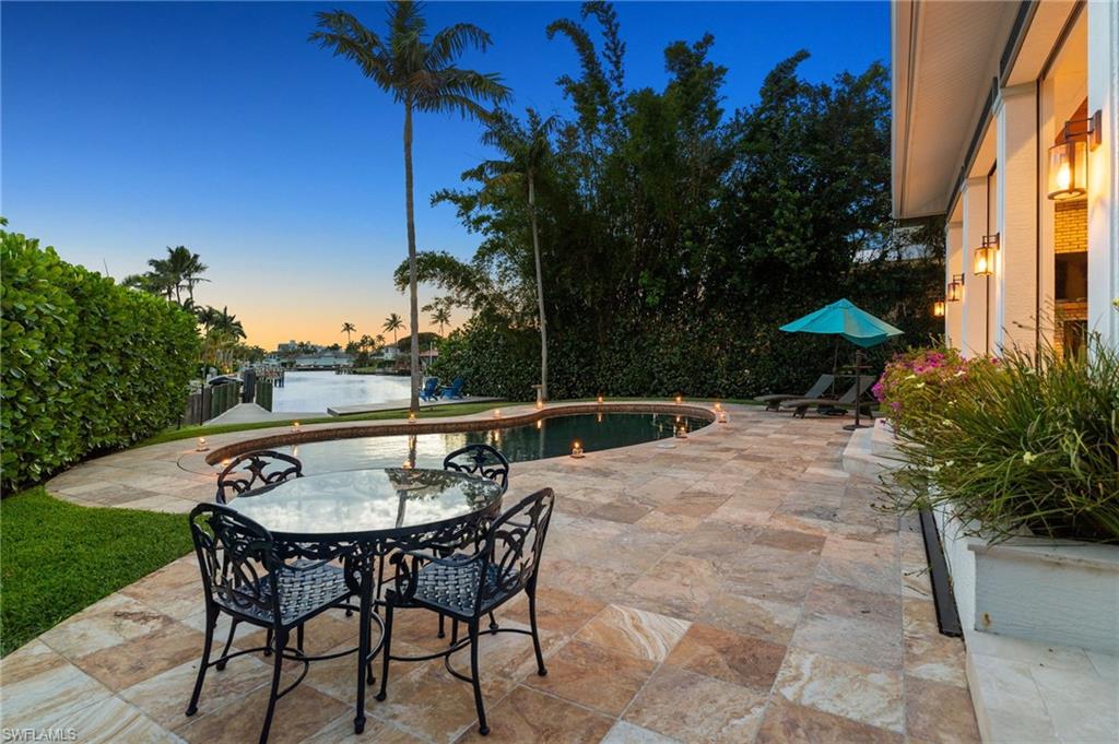 2201 Beacon Lane Naples, FL 34103 - Photo 25 of 25 a view of a chairs and table in the patio