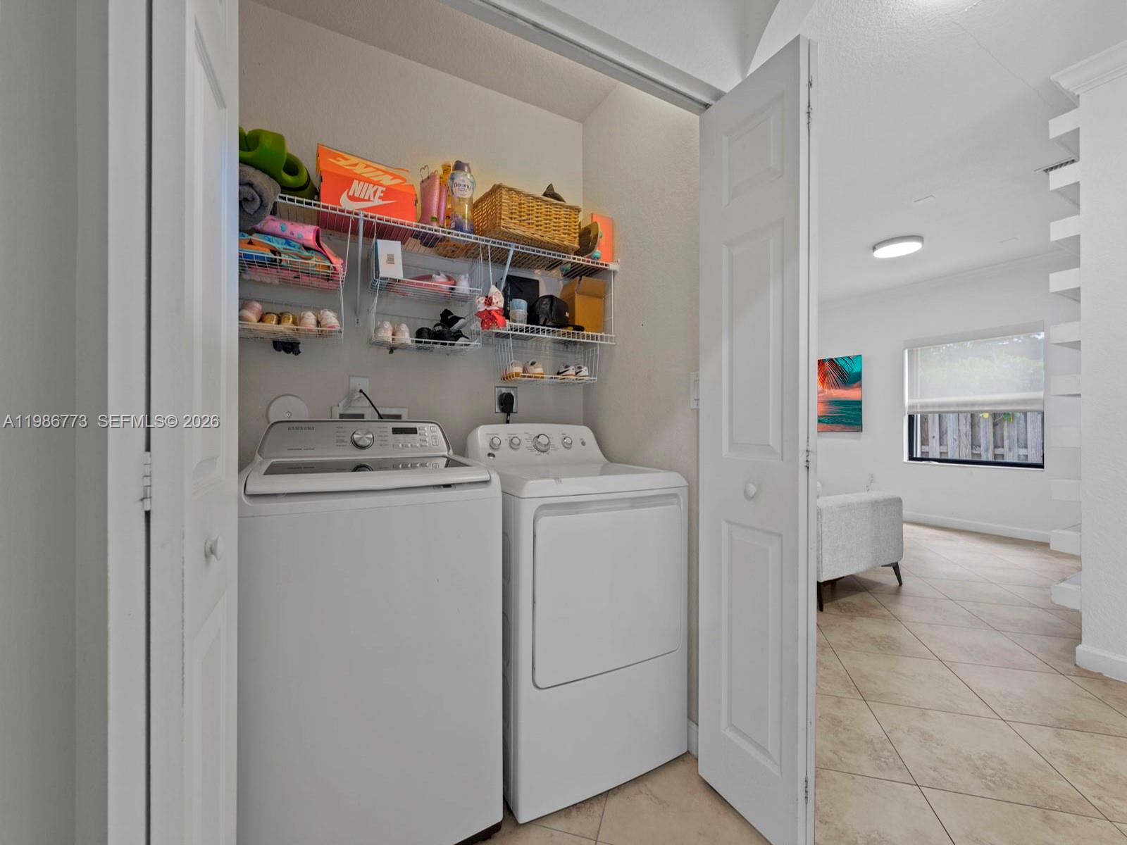 15404 Southwest 175th Street Miami, FL 33187 - Photo 25 of 38 a room with storage and utility