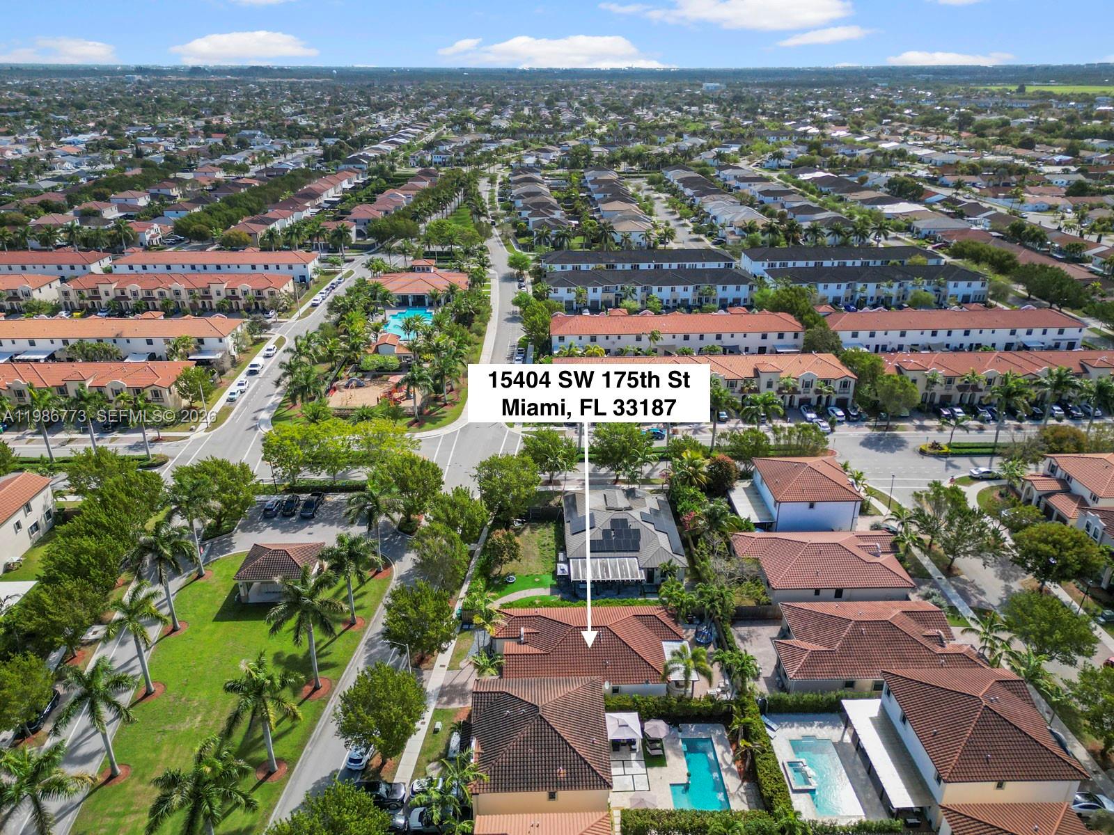 15404 Southwest 175th Street Miami, FL 33187 - Photo 33 of 38 an aerial view of residential houses with city view