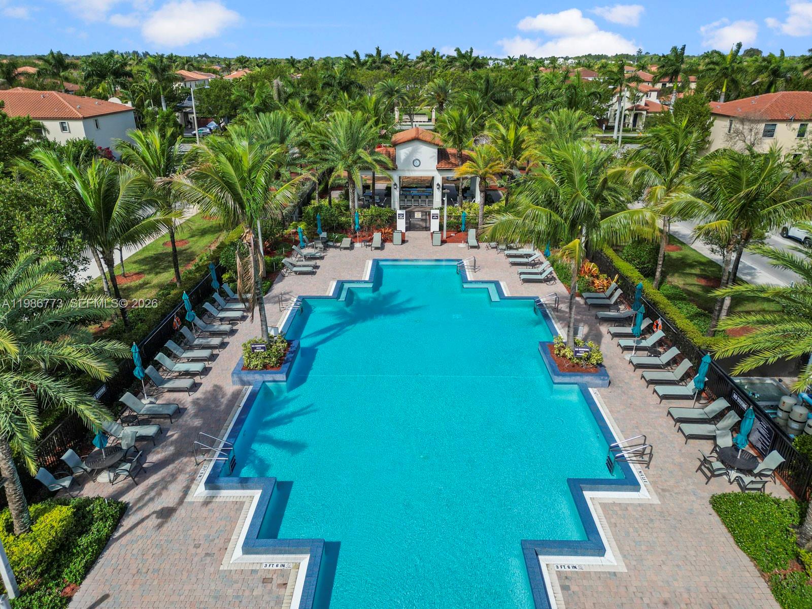 15404 Southwest 175th Street Miami, FL 33187 - Photo 36 of 38 a view of a yard with plants and large trees