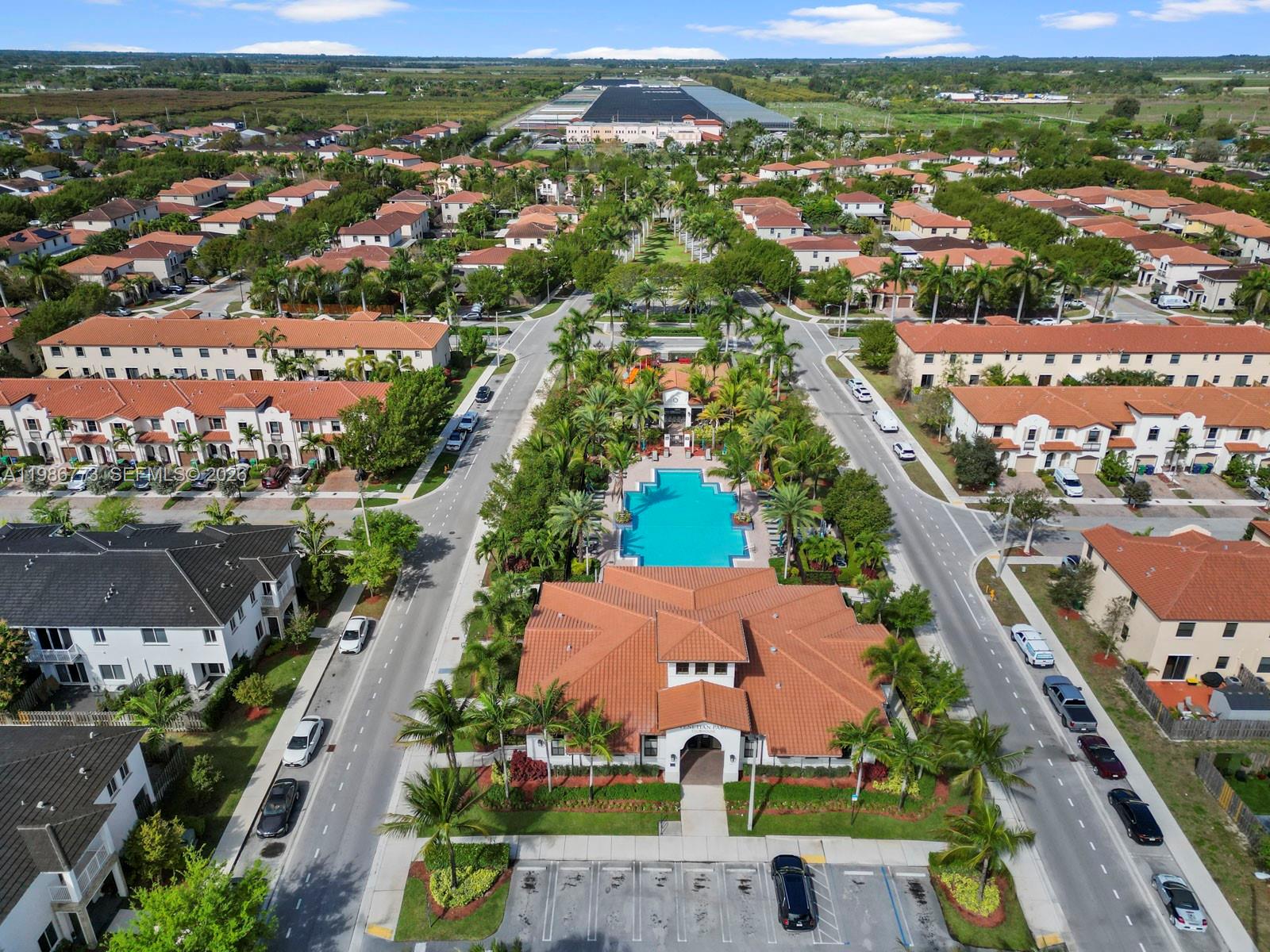 15404 Southwest 175th Street Miami, FL 33187 - Photo 38 of 38 an aerial view of residential houses with outdoor space