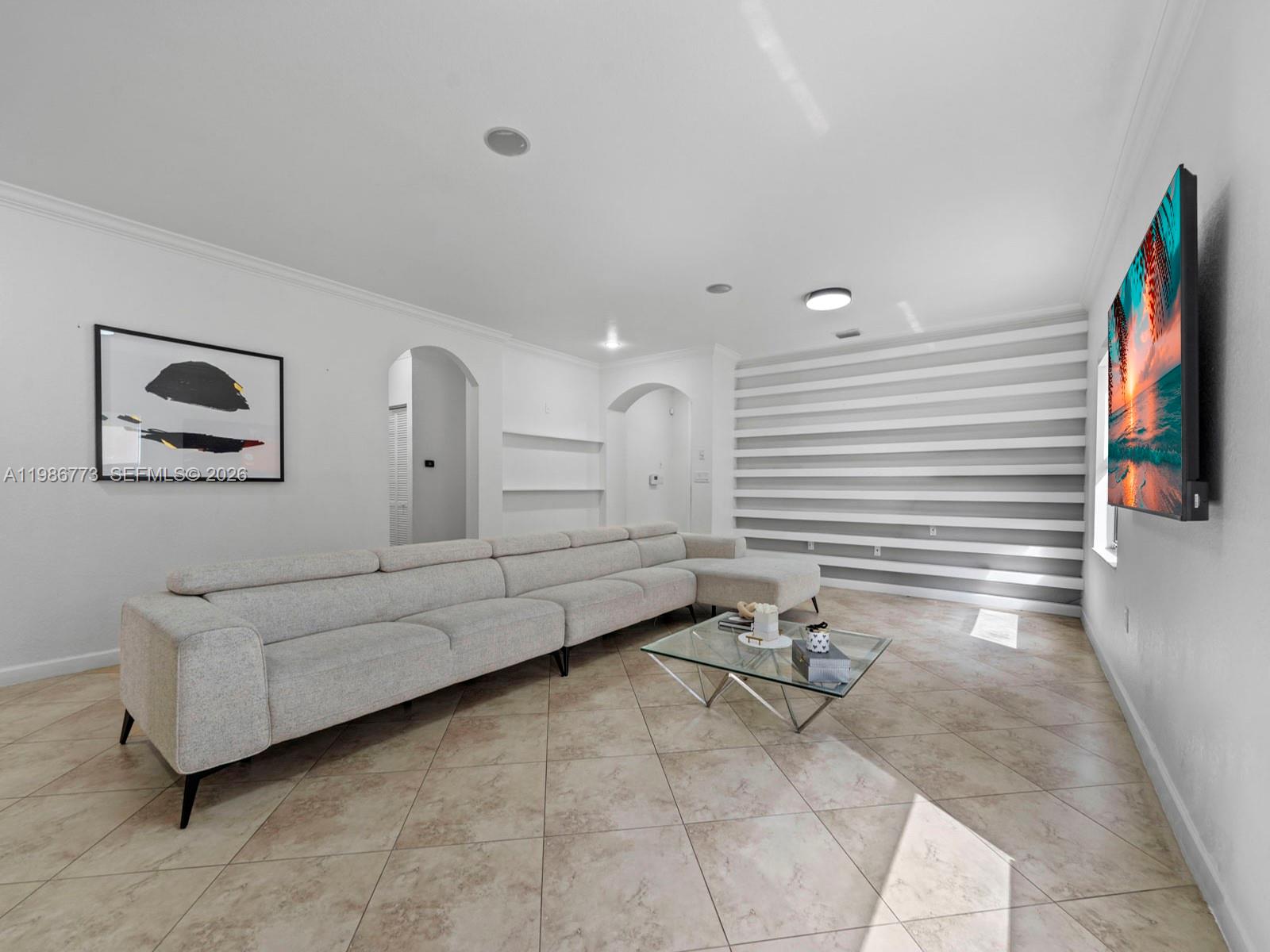 15404 Southwest 175th Street Miami, FL 33187 - Photo 8 of 38 a living room with furniture