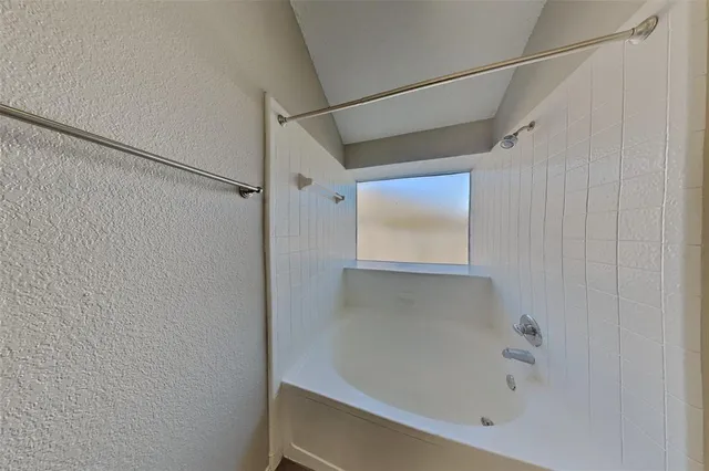 a bathroom with a bathtub