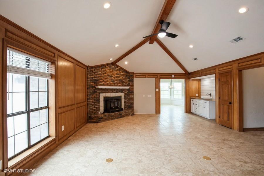 19179 State Highway 64 Canton, TX 75103 - Photo 4 of 15 a view of a livingroom with an empty space and a fireplace