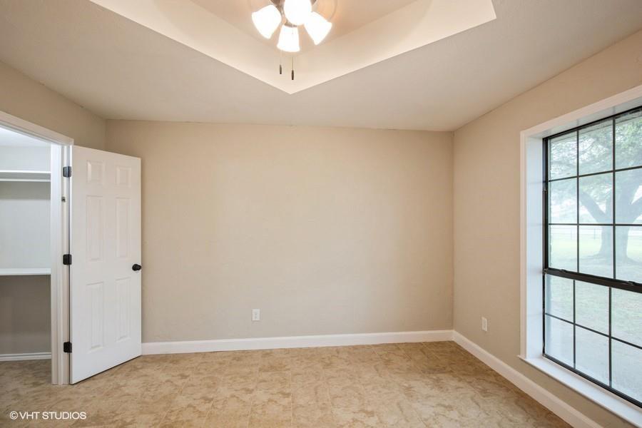 19179 State Highway 64 Canton, TX 75103 - Photo 10 of 15 a view of an empty room with a window
