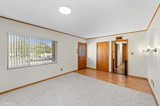 a view of a livingroom with furniture and window