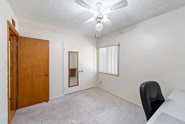 a bathroom with a shower and a sink