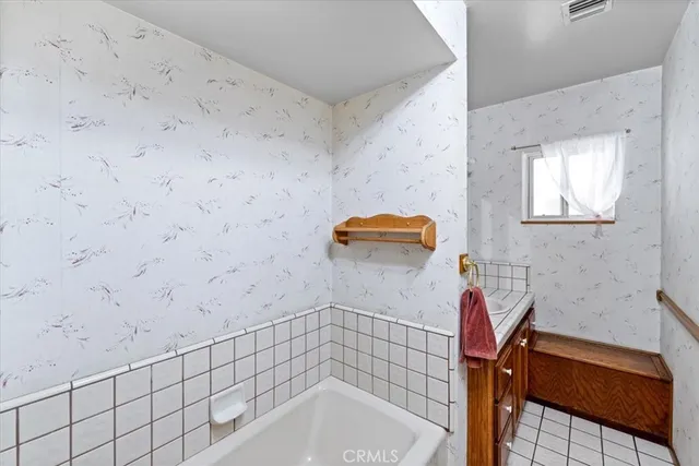 a bathroom with a sink and a tub
