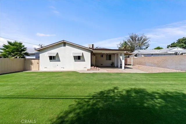 a view of a hallway with stairs