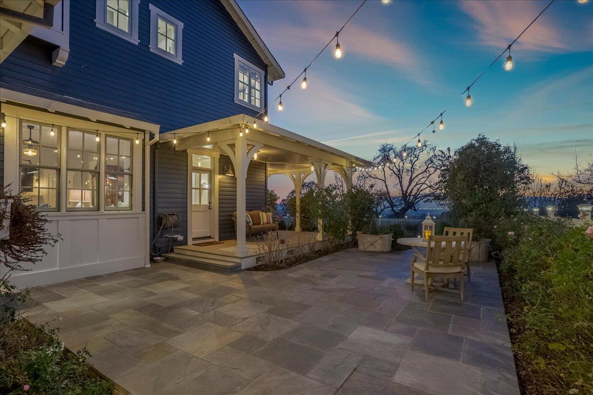 7670 Crews Road Gilroy, CA 95020 - Photo 15 of 83 a view of a patio with table and chairs and potted plants