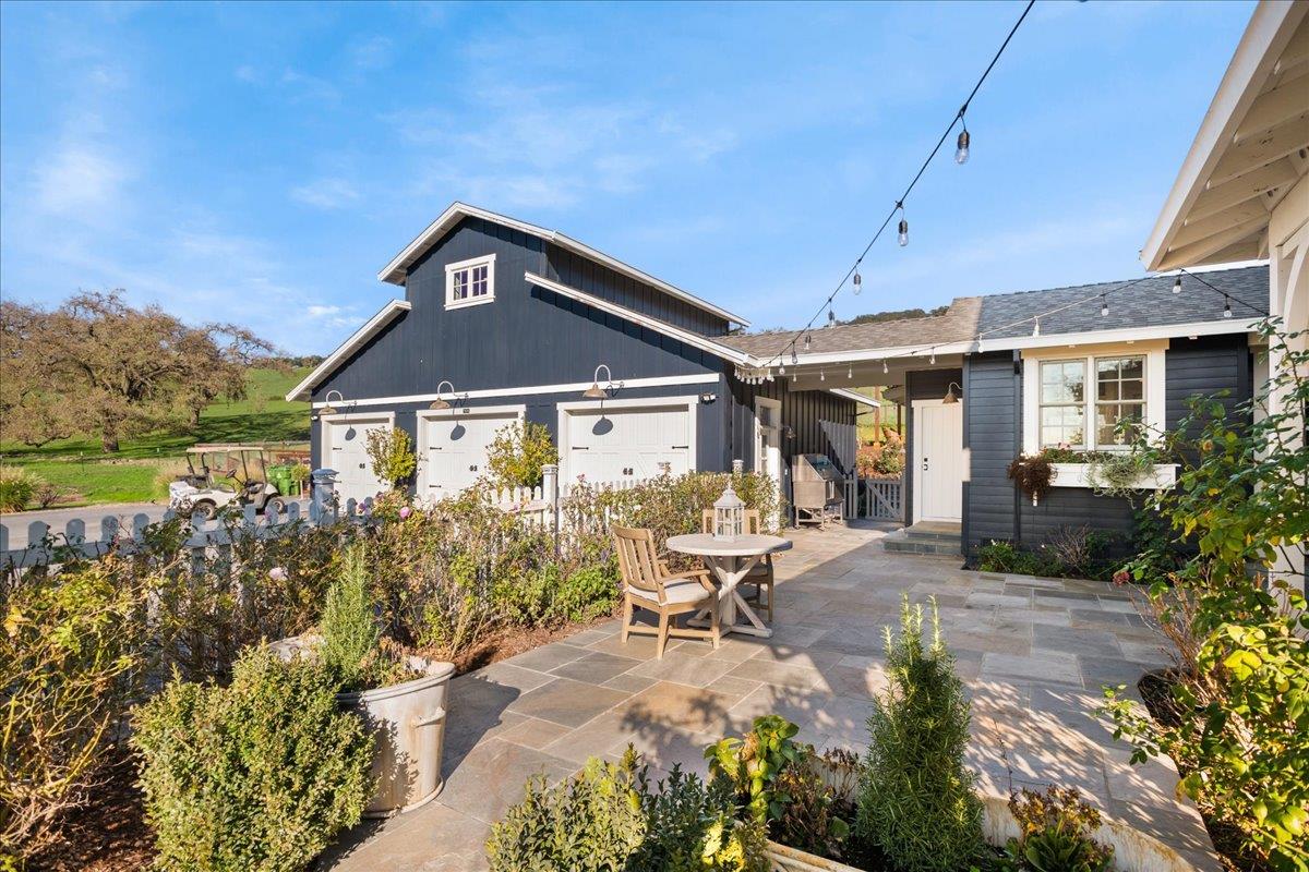 7670 Crews Road Gilroy, CA 95020 - Photo 17 of 83 a front view of a house with garden
