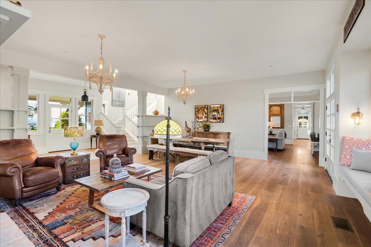 7670 Crews Road Gilroy, CA 95020 - Photo 30 of 83 a living room with furniture a fireplace and a chandelier