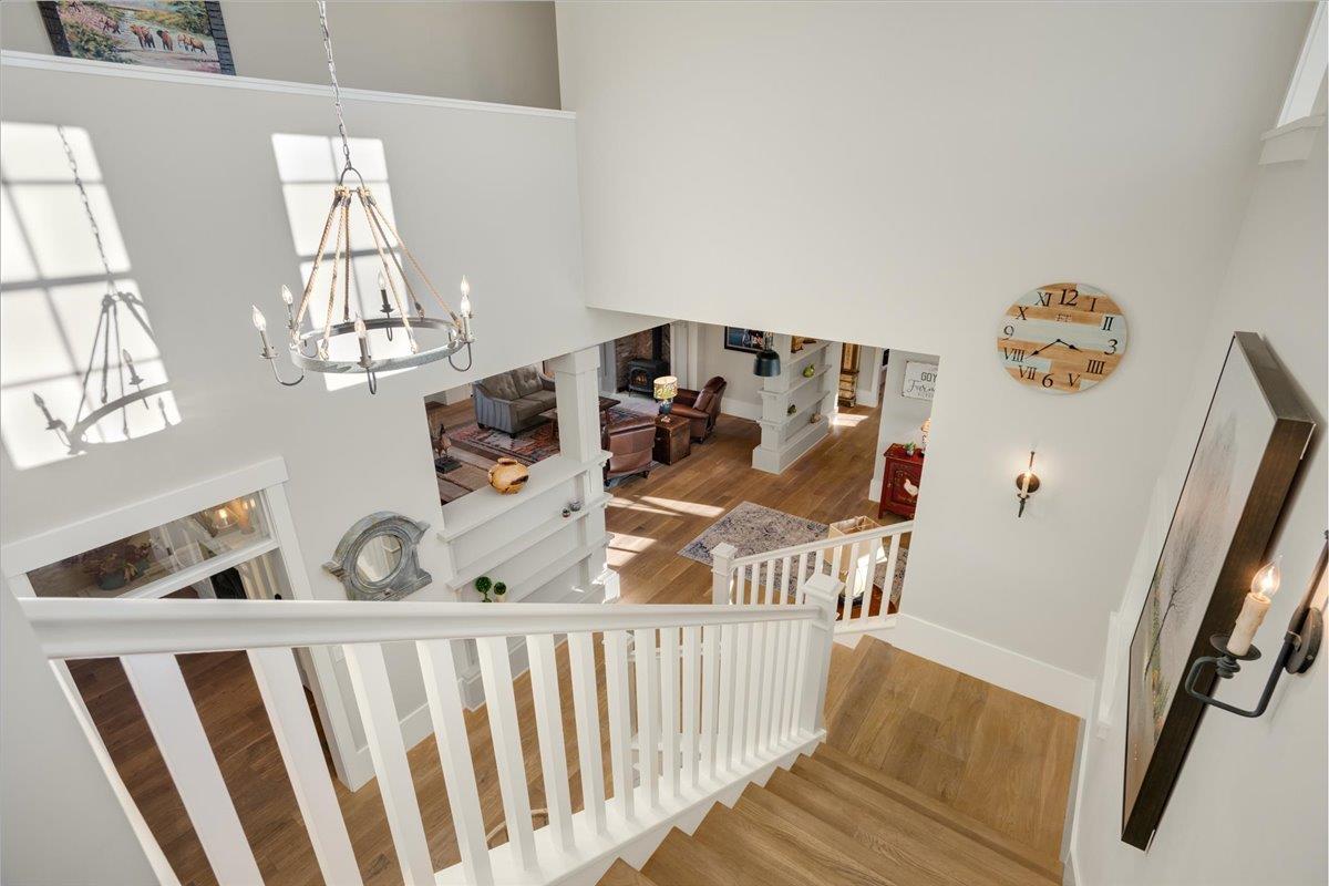7670 Crews Road Gilroy, CA 95020 - Photo 33 of 83 a view of a hallway to a livingroom with furniture wooden floor and windows