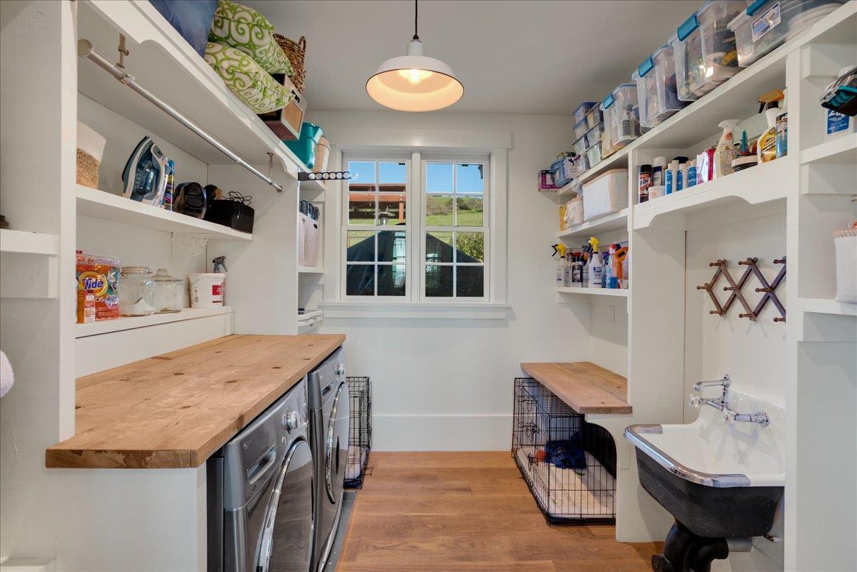 7670 Crews Road Gilroy, CA 95020 - Photo 38 of 83 a bathroom with a sink a vanity and a book shelf