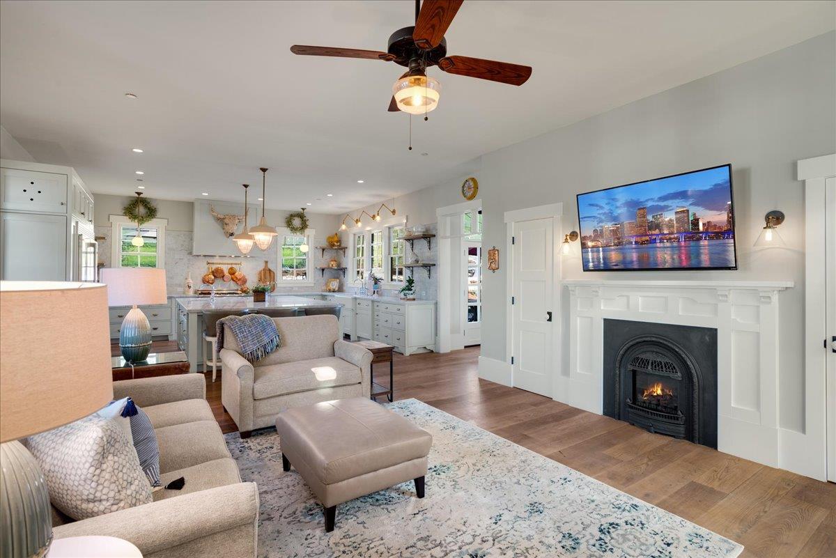 7670 Crews Road Gilroy, CA 95020 - Photo 43 of 83 a living room with furniture and a fireplace