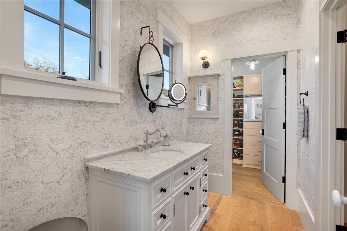 7670 Crews Road Gilroy, CA 95020 - Photo 46 of 83 a bathroom with a sink and a mirror