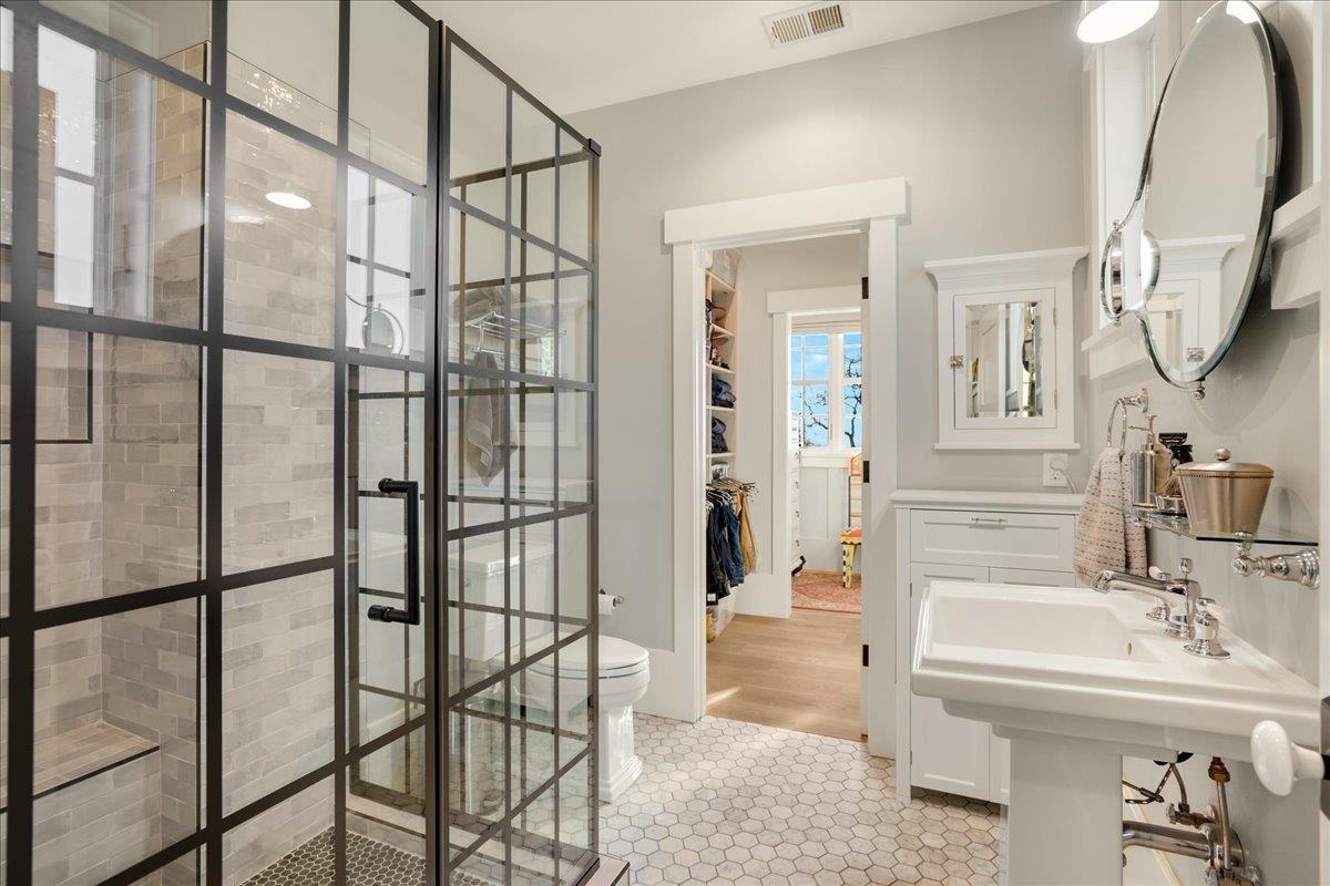 7670 Crews Road Gilroy, CA 95020 - Photo 47 of 83 a bathroom with a sink toilet and shower