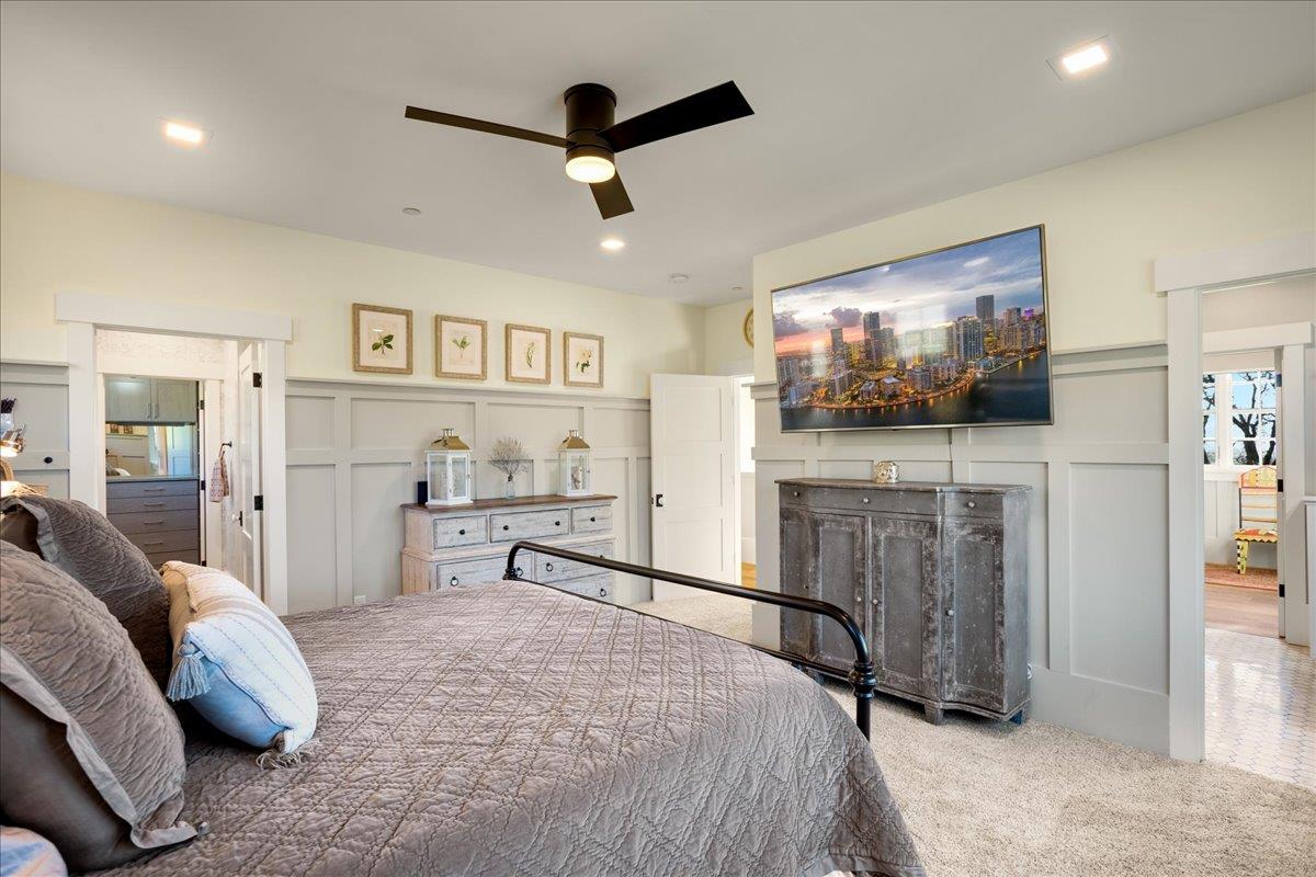 7670 Crews Road Gilroy, CA 95020 - Photo 48 of 83 a bedroom with furniture and a flat screen tv