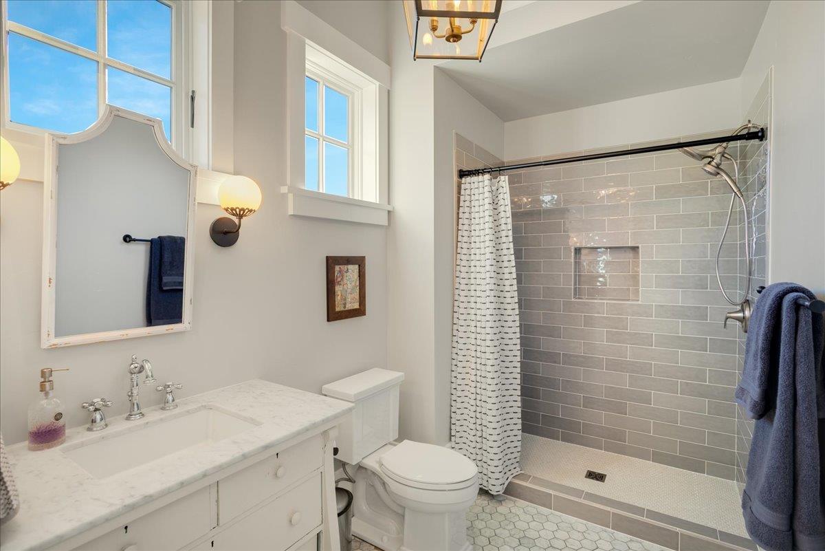 7670 Crews Road Gilroy, CA 95020 - Photo 51 of 83 a bathroom with a sink toilet and shower