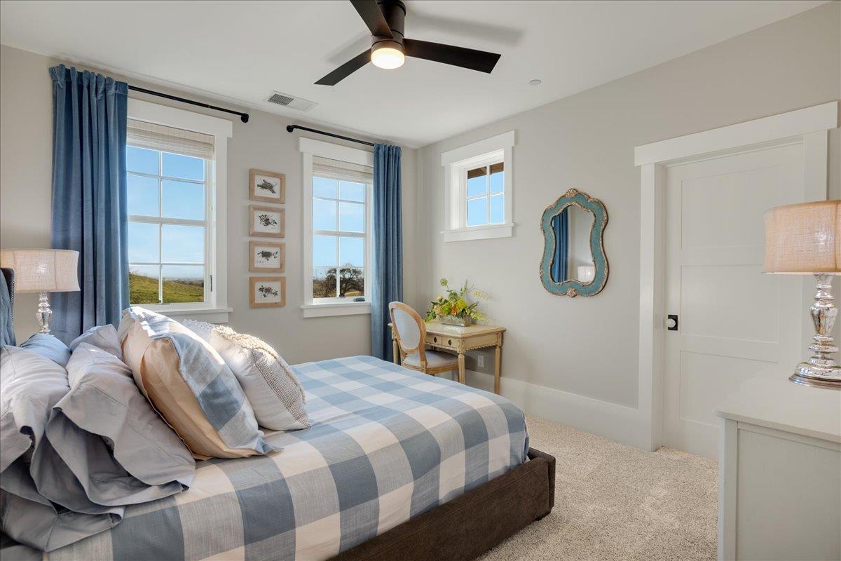 7670 Crews Road Gilroy, CA 95020 - Photo 54 of 83 a bedroom with a bed a chandelier and closet